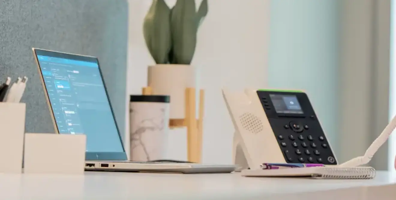 Poly Edge E220 Ip Phone Ip Desk Phone Black Office Female Lifestyle 3 Web Sup M2805717